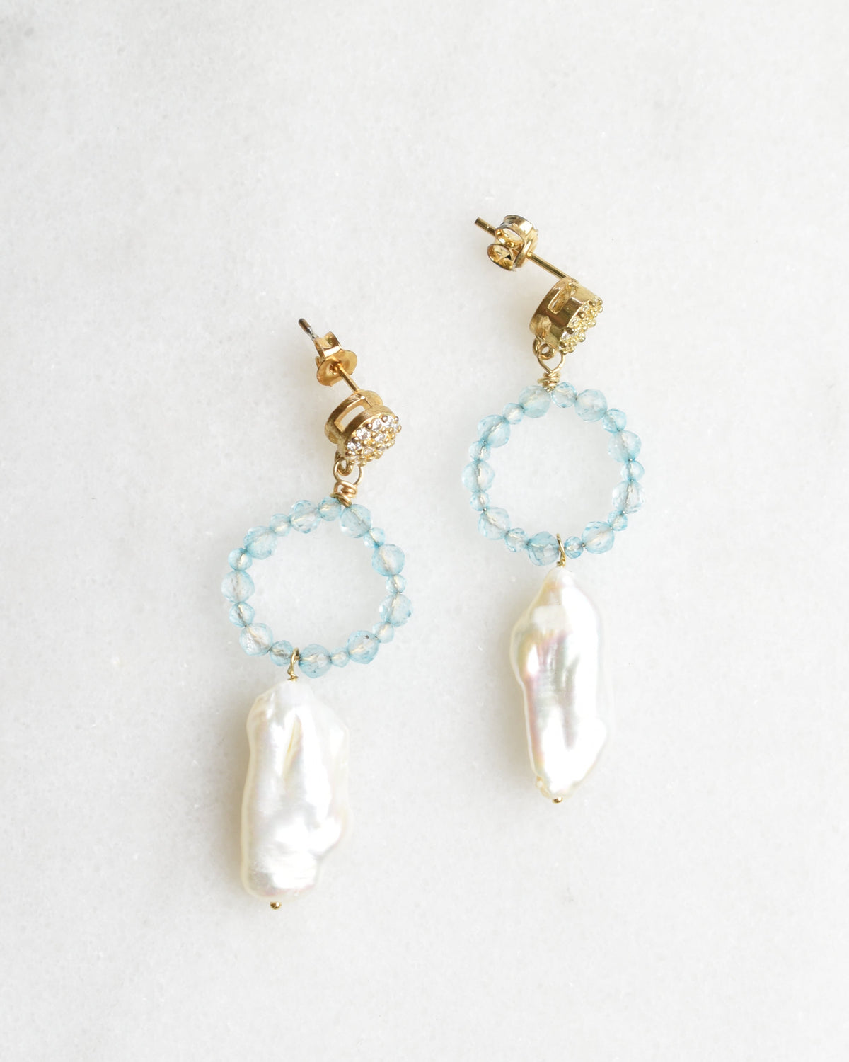 Sparkling Blue Elongated Pearl Post Earrings